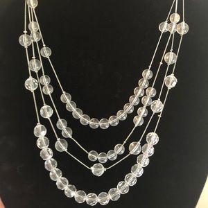 Clear beaded multi strand necklace